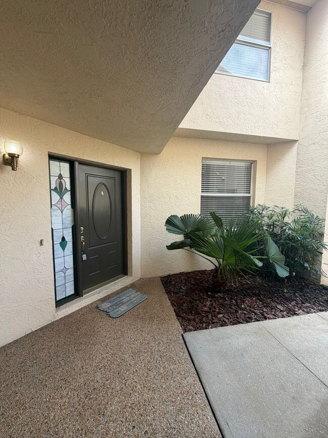 Photo - First floor condo in gated East Lake Woodlands of Oldsmar with one car garage