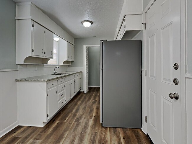 Photo - Newly Renovated Single Family Home | 3 BR/1.5BA | 1-Car Covered Parking | Gated backyard