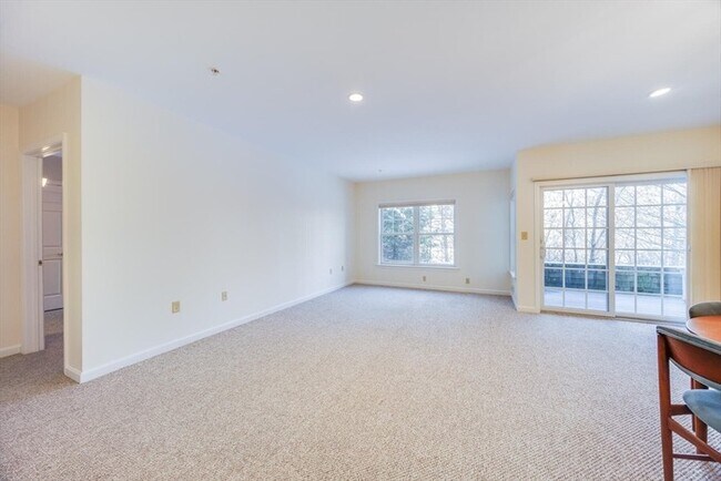 Photo - Updated 2BR Condo with Balcony, Garage Parking & Resort-Style Amenities Unit 106