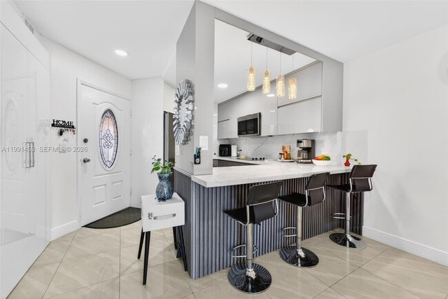 Building Photo - 1750 W 46th St Unit 412