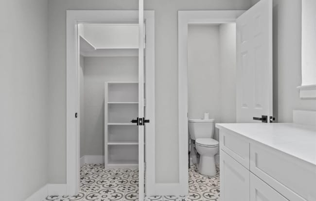 Laundry room with additional pantry and toilet - 110 Pebble Beach Dr