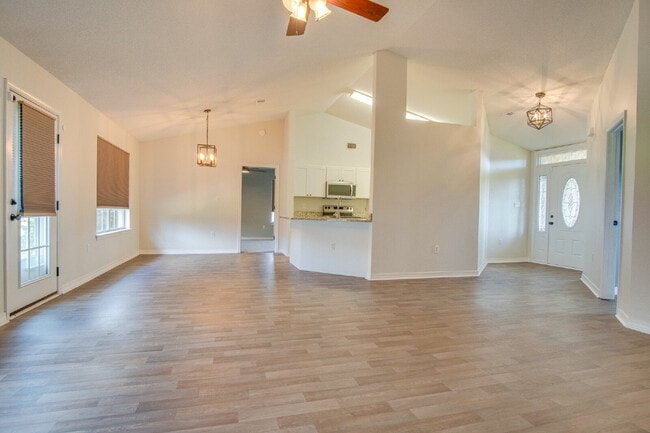 Navarre 4BR, 2BA Home with Open Floor Plan, Split Bedrooms, Wood-Look Flooring, 2-Car Garage & Fe...