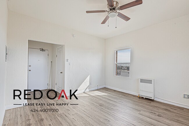 Photo - Studio with Exposed Brick Accent Wall, Lot... Unit 415