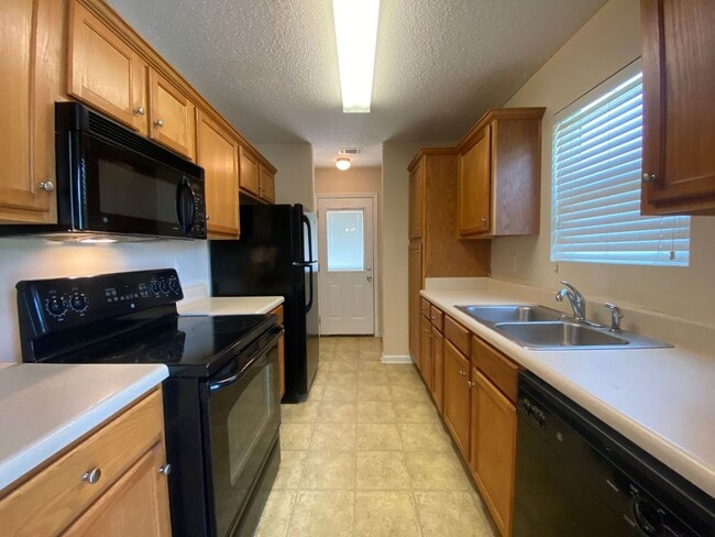 Photo - PRE-LEASING FOR AUGUST 2026- FENCED IN YARD!