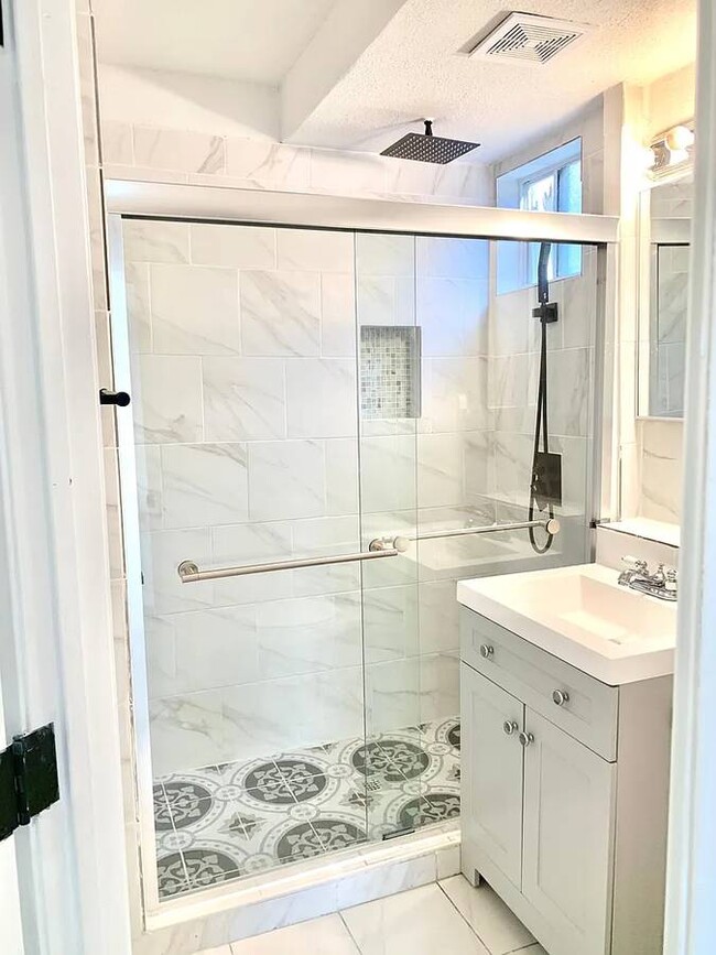 Tiled Bath w/ Rain Showerhead - 3486 National Ave Condo Unit B