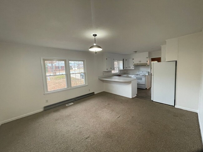 Photo - 3 bedroom 1.5 bath house available. Pet friendly!