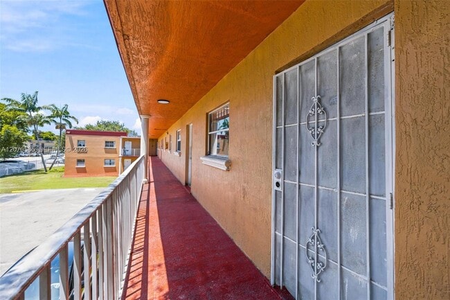 Building Photo - 1245 W 24th St Unit 223