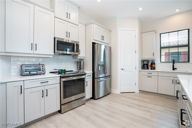 Building Photo - 15257 Zeno Wy Unit 201 Rental