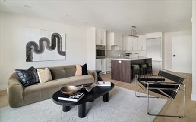 Photo - 1 Bed • 1.5 Bath • Garage Parking • New Luxury Building – Available Now, December, or January