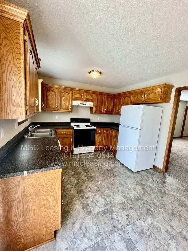 Photo - Raymore Townhome with Unfinished Basement ...