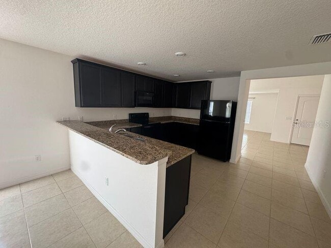 Photo - 6909 Crested Orchid Dr