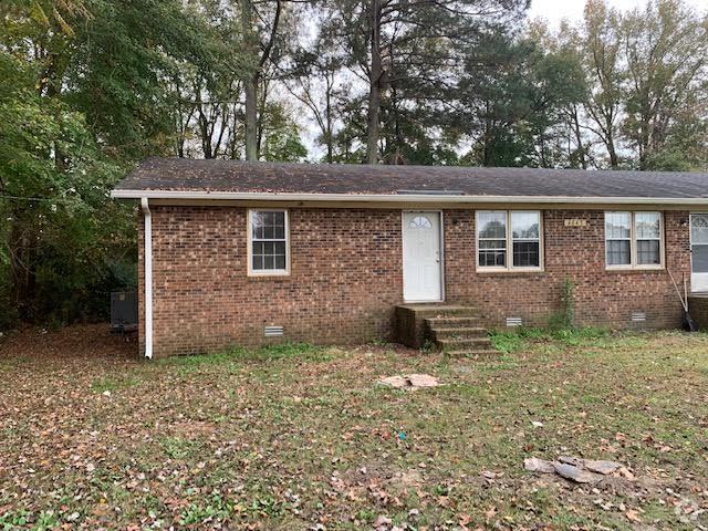 Building Photo - "Charming 2-Bedroom Duplex with Spacious L... Unit A Rental