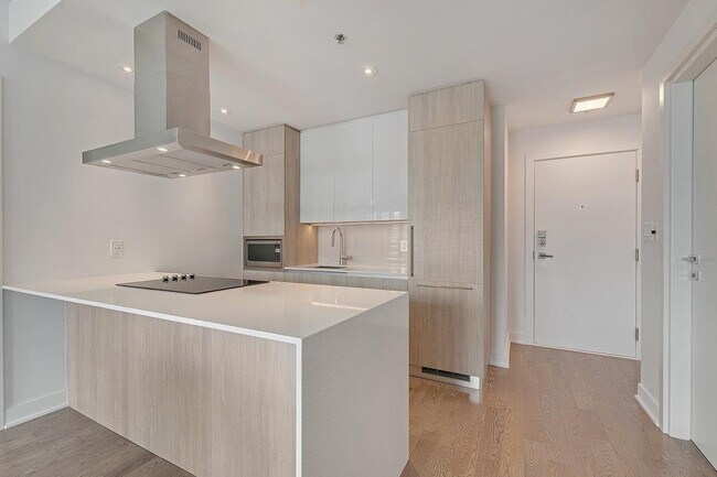 Photo - 1212 Drummond Unité 210