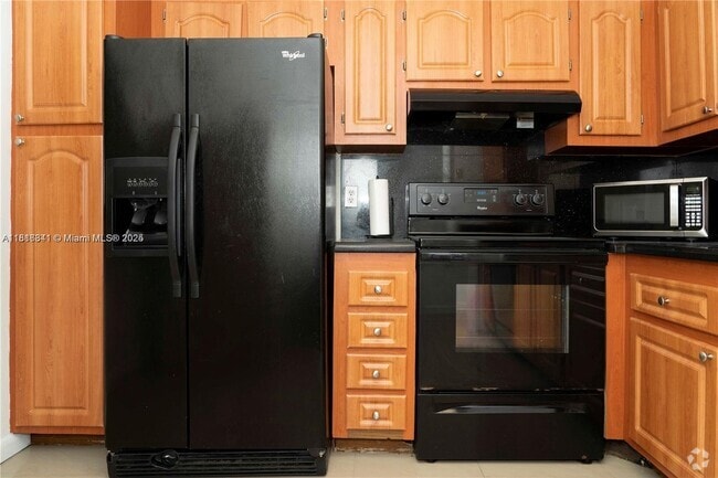Building Photo - 5140 SW 40th Ave Unit 23C Rental