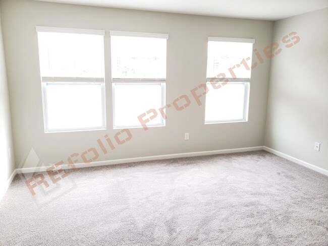 Photo - Beautiful Luxury 3 Story 3 Bedroom Townhome with 1st Floor Guest Suite, Attached 2 Car Garage, Co...