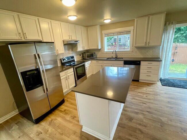 Kitchen with Island - 11219 Borgen Loop