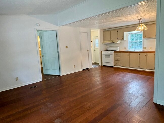 Living room into kitchen - 11677 US Highway 31