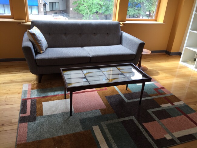 tastefully decorated, comfortable living room - 116 St Paul St Unit Loft C