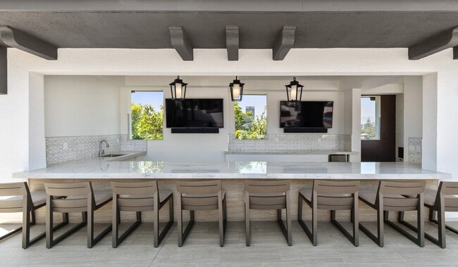 Exclusive rooftop deck features TVs