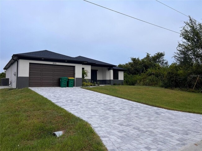 Building Photo - Be the first in occupy this 2025 constructed home in the vibrant city of Port Charlotte, FL! Qual...