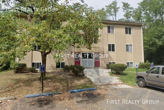 Building Photo - 5620 N Main St Unit Apt. 205