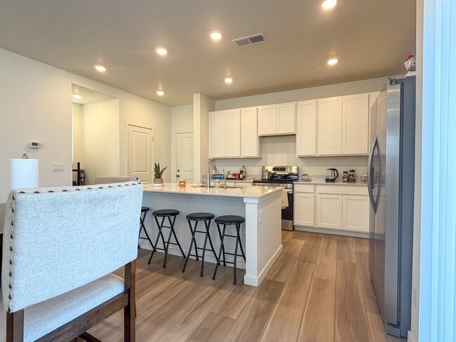 Building Photo - Like-New Single-Family Home in Bennett!