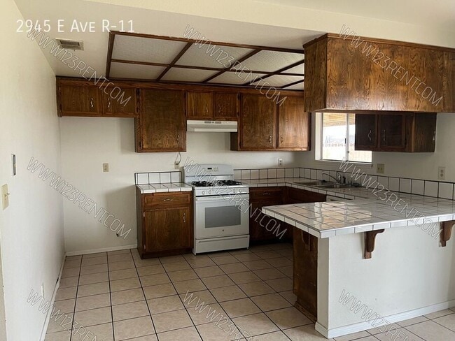 Photo - 2945 E Ave R-11