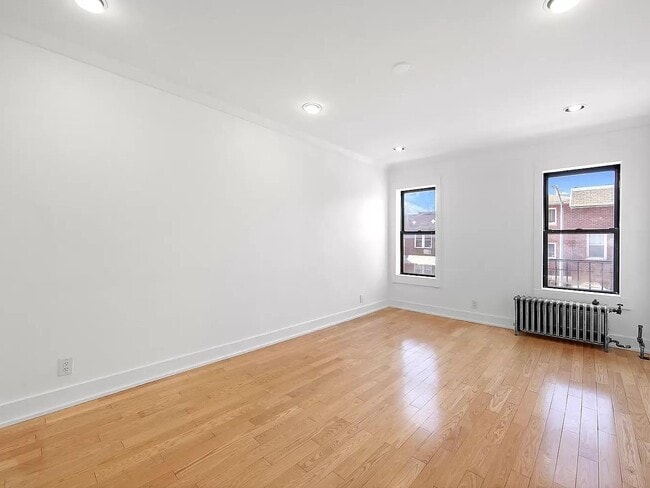 Building Photo - 44-14 Newtown Rd