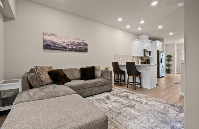Photo - Modern 3-Bedroom Townhome-Style Home with Attached Garage, Private Patio & En-Suite Bathrooms in ...