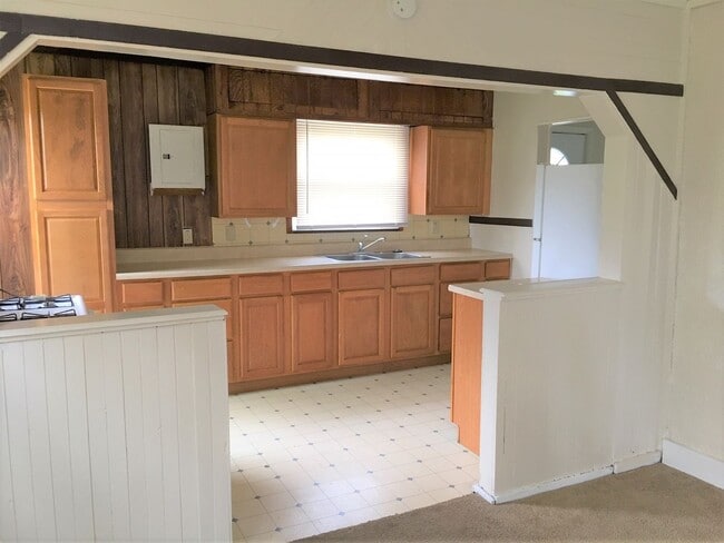 Photo - Three Bedroom Home with Main Floor Laundry on a Large Acre + Lot!!