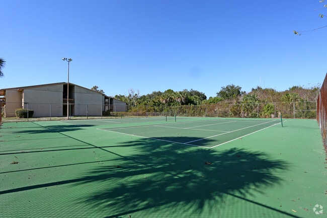 Tennis court - Emerald Place Apartments