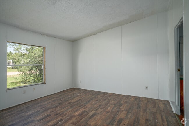 4BR, 2BA - 1,417SF - Primary Bedroom