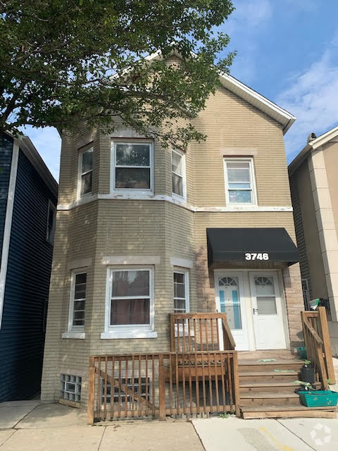 Building Photo - 3746 S Wallace St Unit 2R Rental