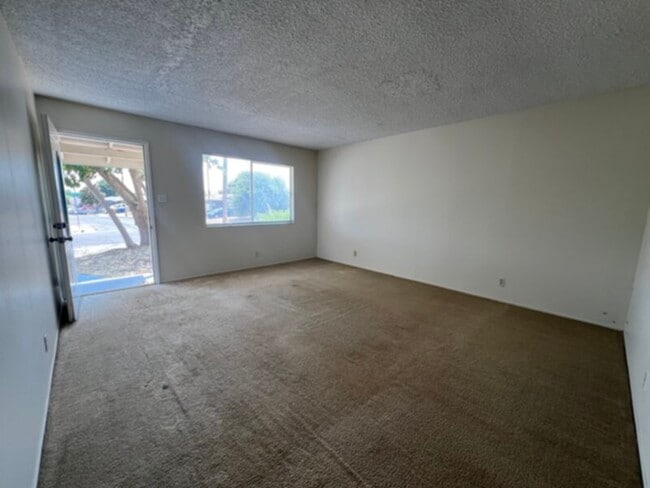 Photo - Charming 3 Bedroom, 2 Bathroom Single Family Home with Two Car Garage and Backyard!