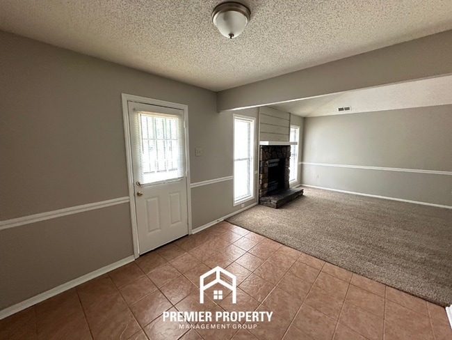 Photo - Charming 3BR/2BA in Country Brook | Vaulted Ceilings, Fireplace & Fenced Yard