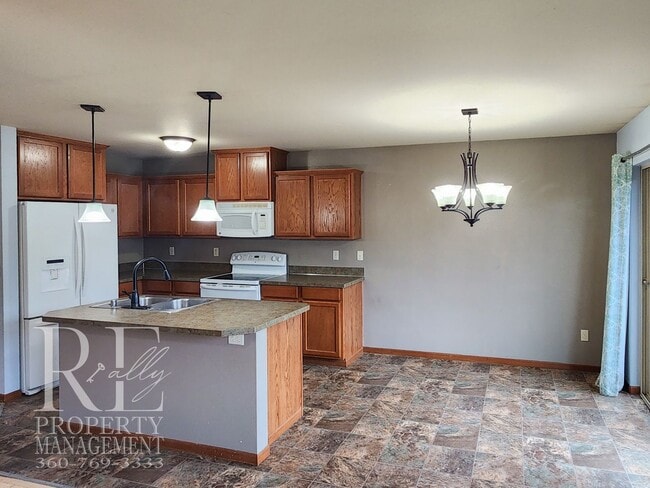 Photo - Beautiful Single-Story Home with Hardwood Floors, 3-Car Garage & Expansive Backyard