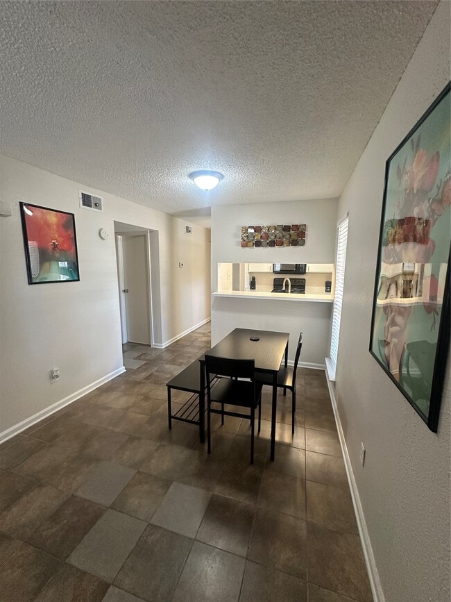 Building Photo - 6601 Sands Point Dr Unit 74