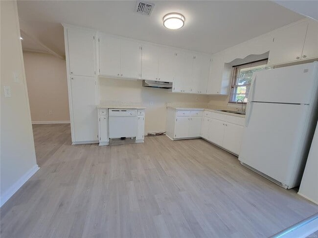 Photo - NEW Floors, Roof, Lights, Appliances, ect. NO CARPET