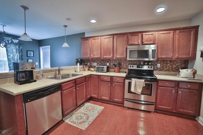 Photo - Upscale 3 to 4 BR home in The Willows at Leland. Two car garage, community pool!