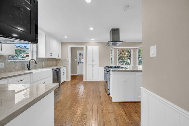 Photo - Welcome to this stunning 4-bedroom, 2.5-bath home on a quarter of an acre lot nestled in the high...