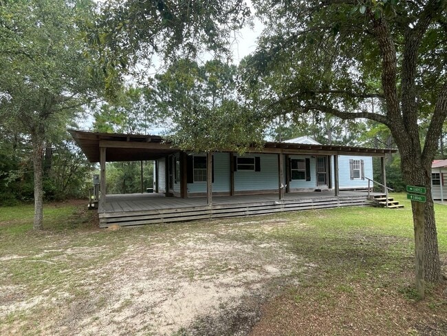 Building Photo - 3 BEDROOM LOCATED ON SHADED ACRE LOT Rental