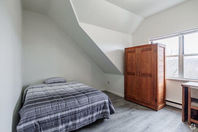 4BR, 1.5BA - 1,415SF Furnished Bedroom