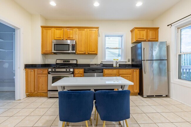 Photo - Massive 5 Bed / 2 Bath Duplex in Mission Hill — 2,000 Sq Ft, In-Unit Laundry, Updated Kitchen, Pr...