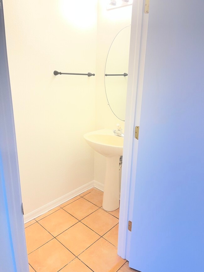 Half Bath dowstairs - 2537 Harn Blvd