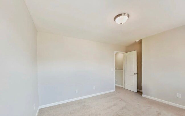 Photo - Spacious 3-Bedroom House with Cozy Living Spaces