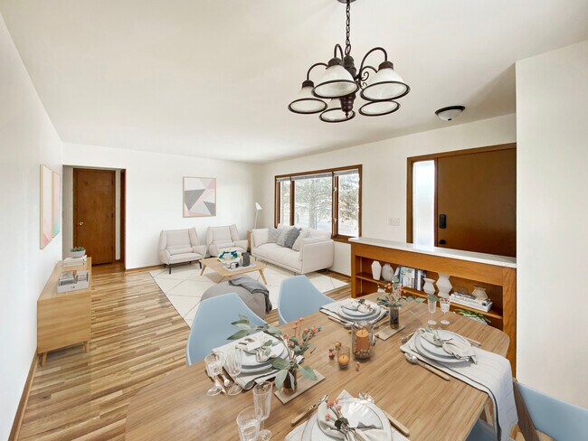Great dining room space between the kitchen and living room. - 720 Silver Lake Road NW