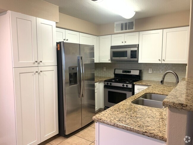 Building Photo - Thrive in this upgraded first-floor two be... Rental