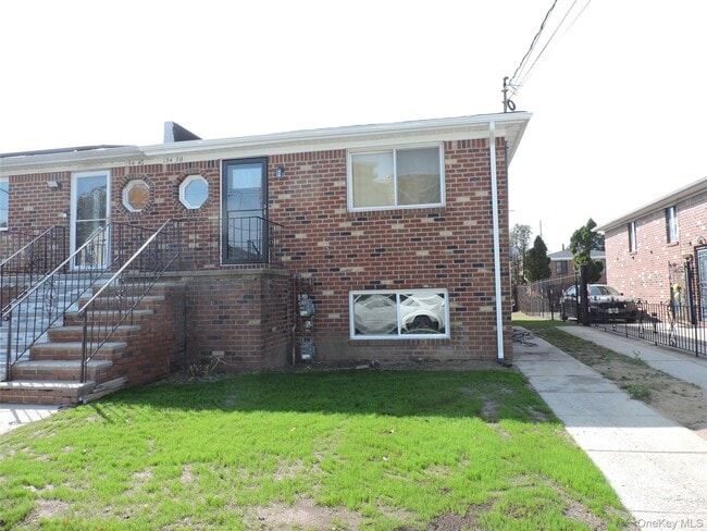 Building Photo - 134-38 161st St Unit 1