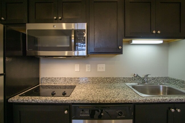 Photo - Contemporary Townhouse w Electric Fireplace, DW, & Juliette Balcony! Unit 08