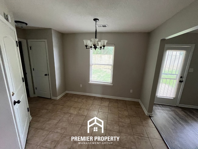 Photo - Beautiful 4BR/2BA Home | 1,605 Sq Ft, Soaring Vaulted Ceilings & 2-Car Garage